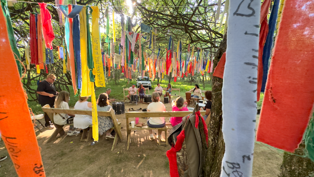 Alumni enjoying a drum circle session at JourneyPure