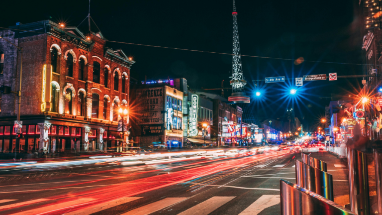 Broadway in Nashville is known for its neon lights, lively honky-tonks, and world-class live music