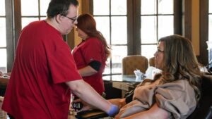 Blood donors talking with doctors at JourneyPure